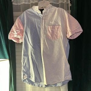 Large, white, light pink, and light blue button up shirt.